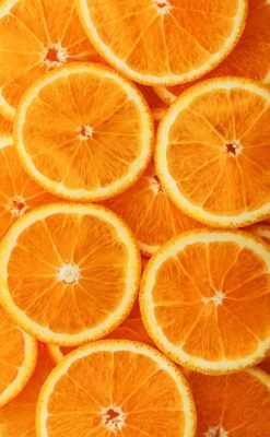 127280387-round-orange-slices-in-the-form-of-texture-and-lanterns-of-fresh-juicy-slices-fullscreen-flat-transformed