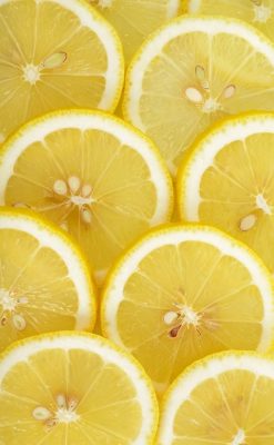 52082947-close-up-sliced-yellow-lemon-background-texture-transformed